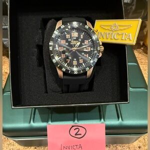 Invicta Black and Gold Watch with Root Beer Accents